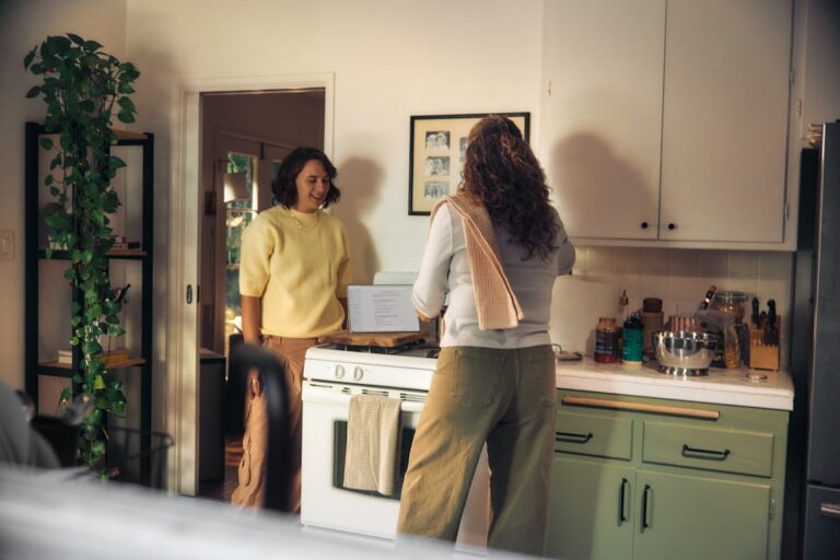 Person using a medical bill negotiation script on a phone call at home