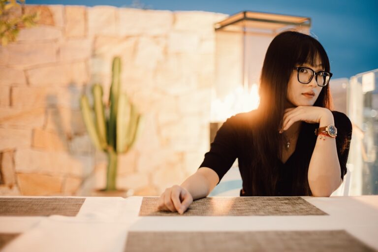 Woman reviewing her credit score by age at home, looking at financial documents